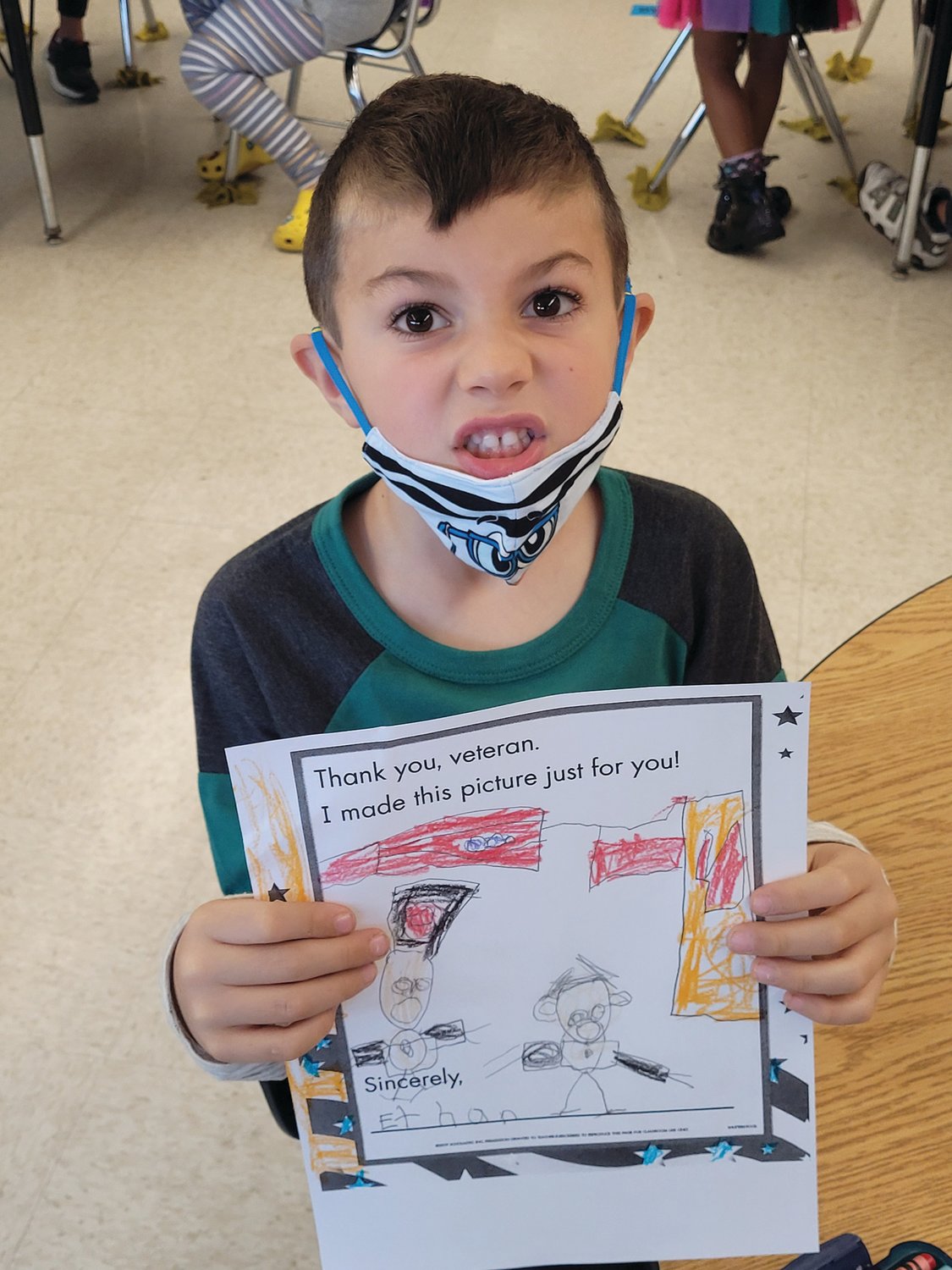 Barnes School students in Johnston first drew pictures for veterans, and then attached the drawings to bags they filled with snacks and toiletries.